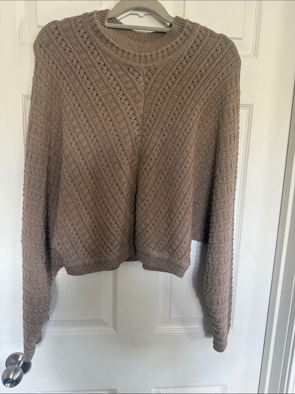 Promesa Taupe Open-Knit Crewneck Sweater with batwing sleeves.